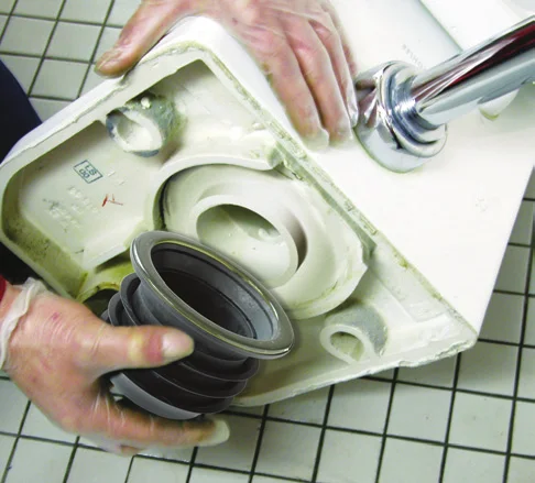 Fernco wax-free seal attached to the horn of a back-outlet toilet