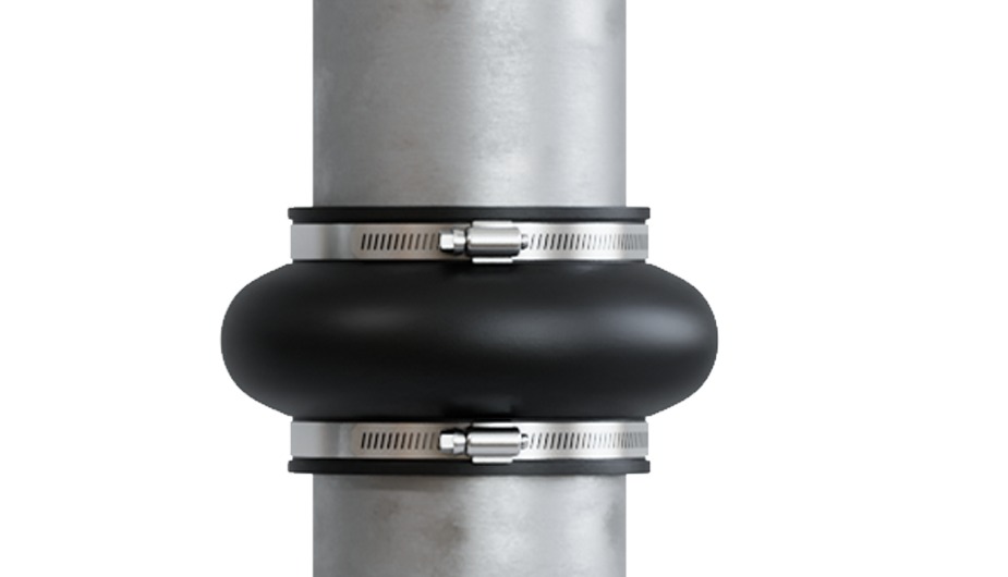 Fernco Expansion Joint with the pipe expanded, body compressed and widened